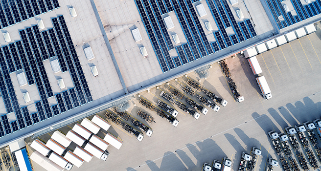 solar panel next to a shipping yard 
